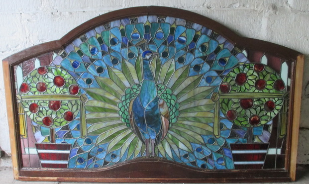 art nouveau leaded glass window with paon