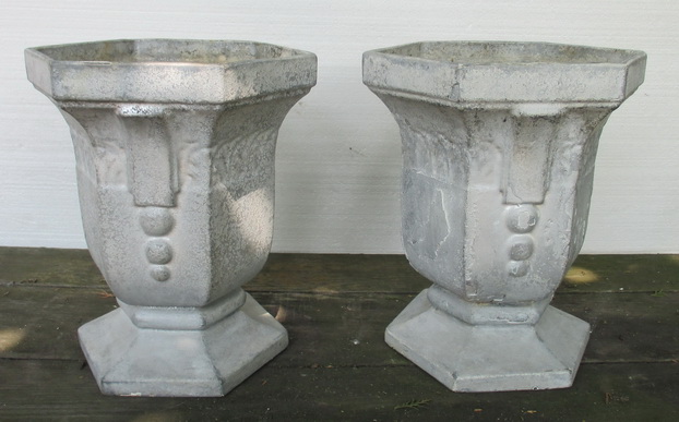 antique geometric cast iron garden vases